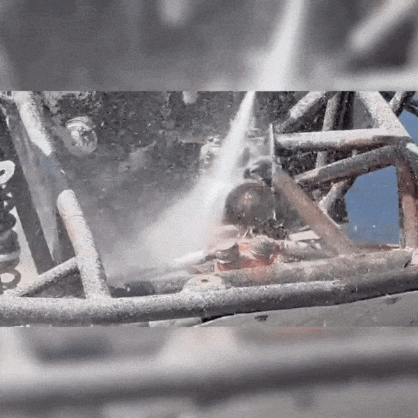 Carbide 600 wet blasting rust from a buggy frame